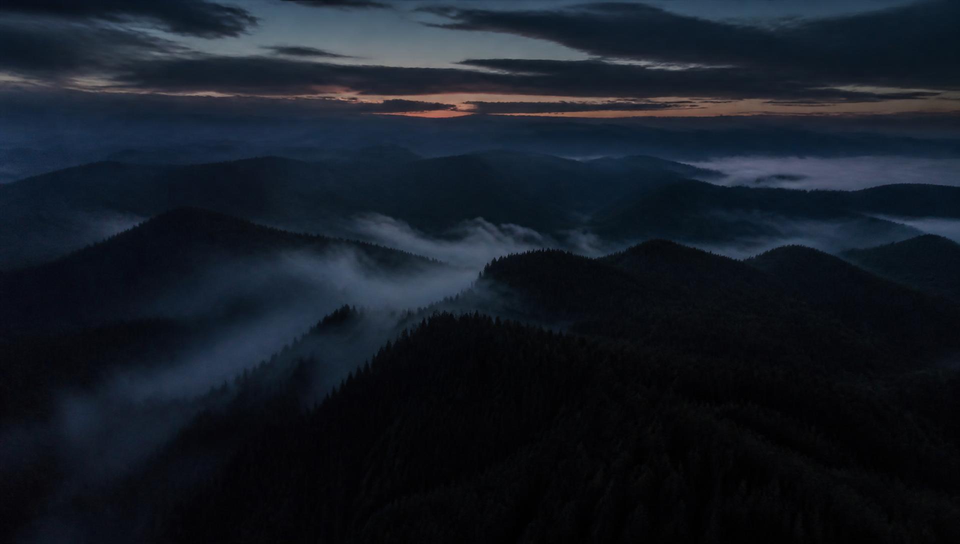 Aerial view of mountain ridgelines at dusk